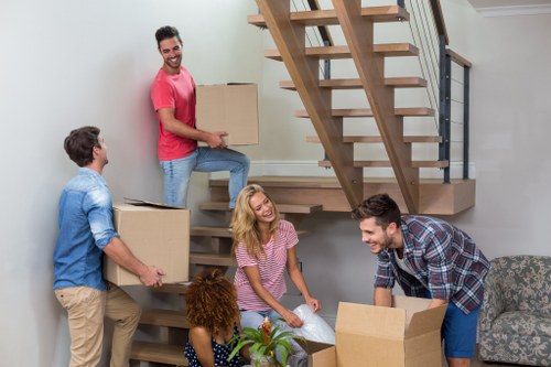 Removal team planning a move near Holland Park residential properties