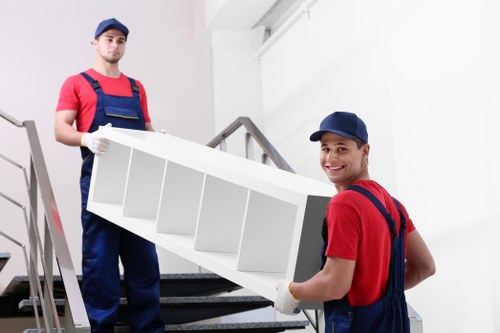 Student removals planning in Holland Park with boxes and furniture