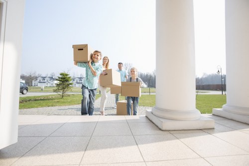Packed boxes and furniture prepared for a local house move