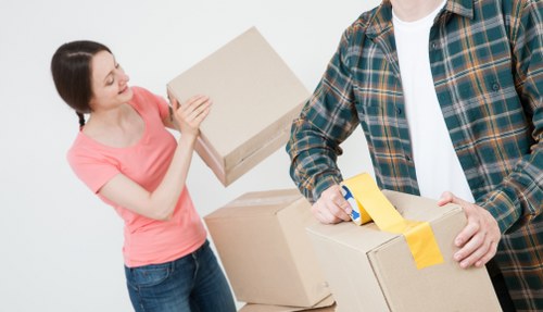 Man and van moving service helping a customer in Holland Park