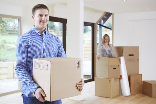 Preparing boxes and furniture for a house move in Holland Park