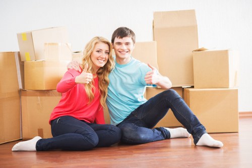Careful loading of furniture for house removals in a Holland Park property
