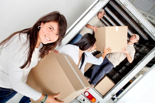 Packing and transport of office equipment during a Holland Park business move