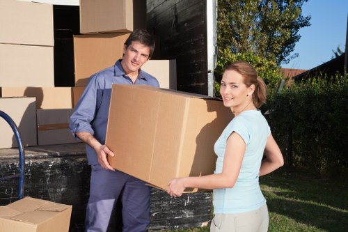 Business relocation team handling furniture and office contents in West London